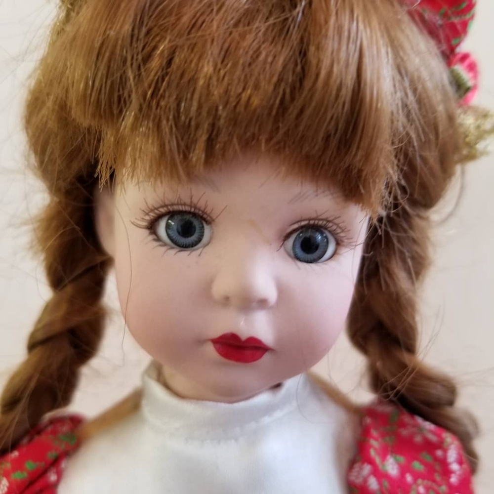 Porcelain European doll. BRASS KEY COLLECTION.